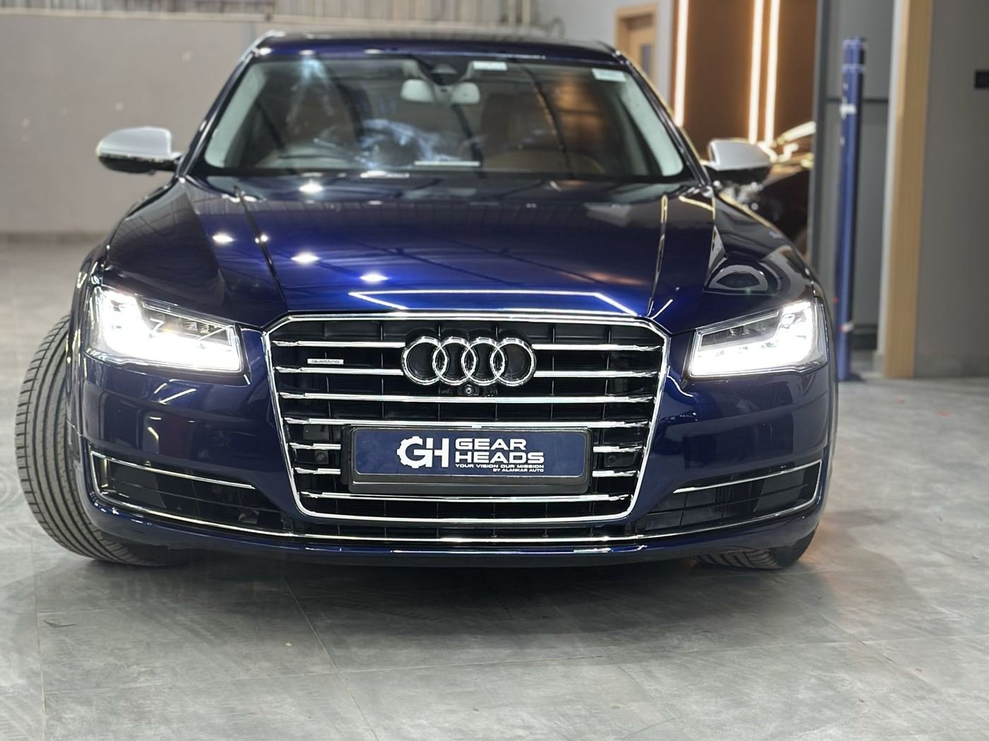 Glossy blue Audi A8 L after detailing at Gear Heads